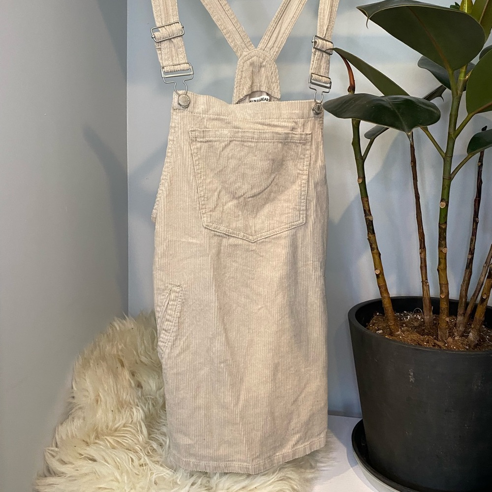 Overall dress in beige